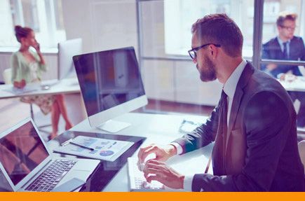 Picture of businessman working at computer